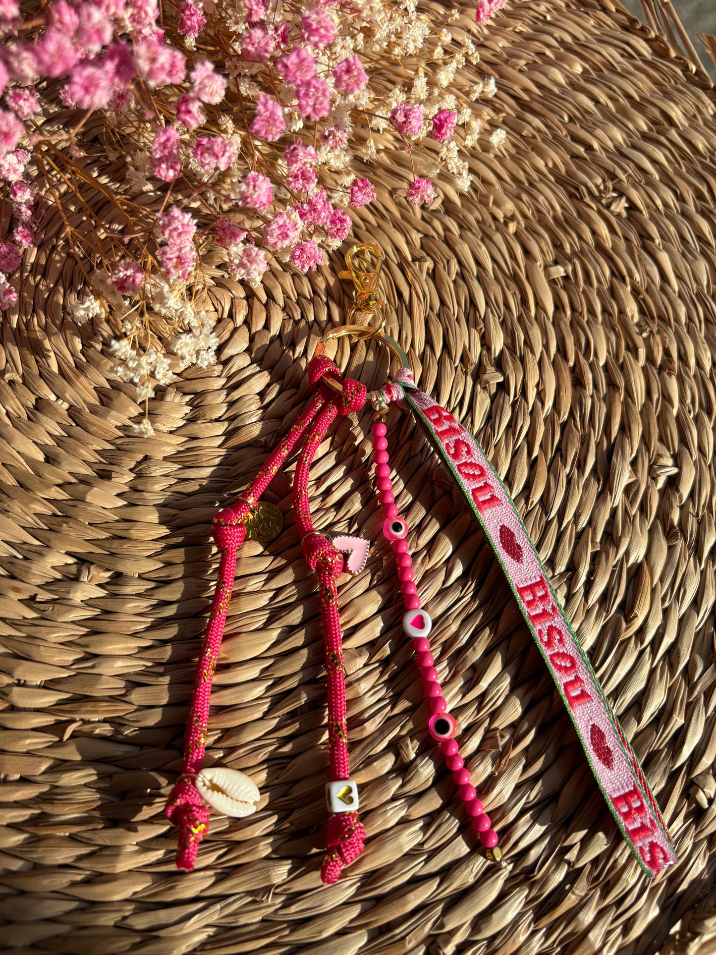 Grigri porte clef bisou rose