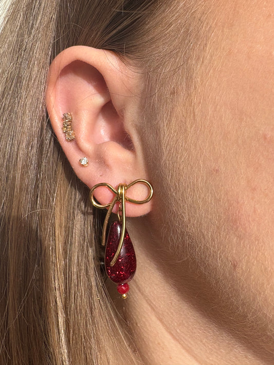 Boucles d’oreilles noeud gouttes bordeaux pailletées